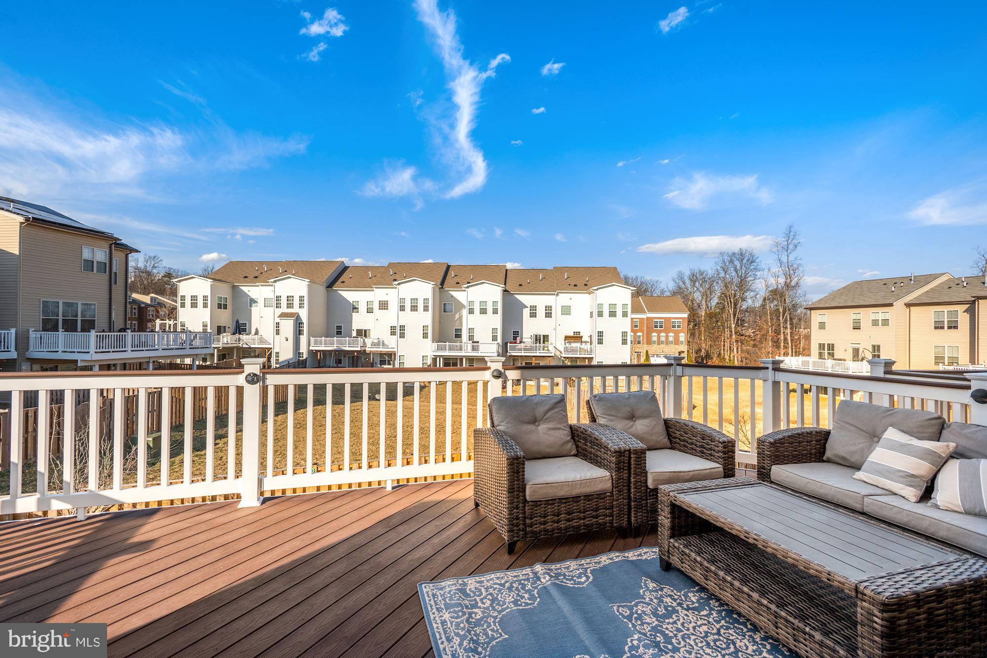 42186 Castle Ridge Square Brambleton, VA 20148 - Photo 16 of 37 Large composite deck overlookng fenced-in yard!