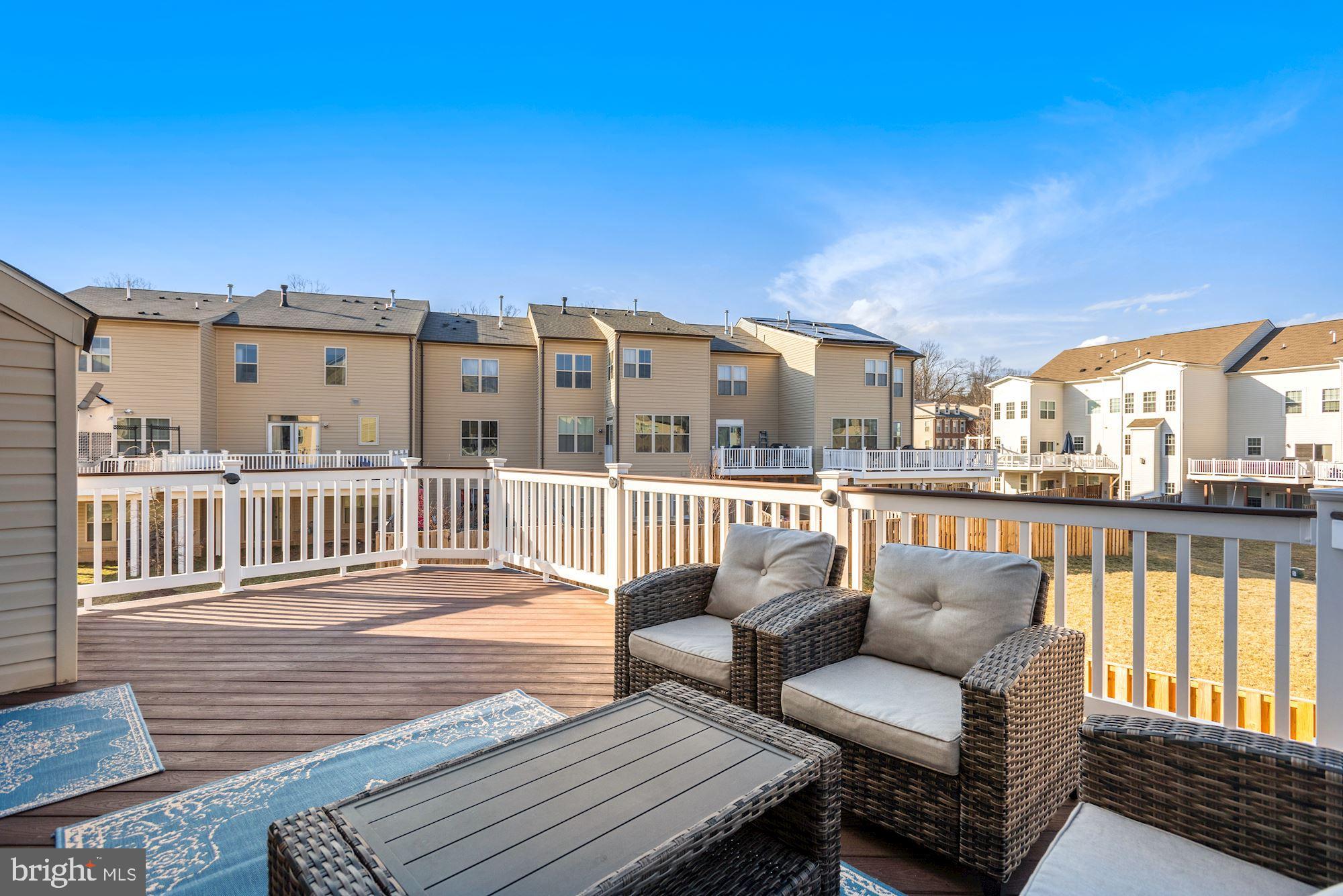 42186 Castle Ridge Square Brambleton, VA 20148 - Photo 18 of 37 Large composite deck overlookng fenced-in yard!
