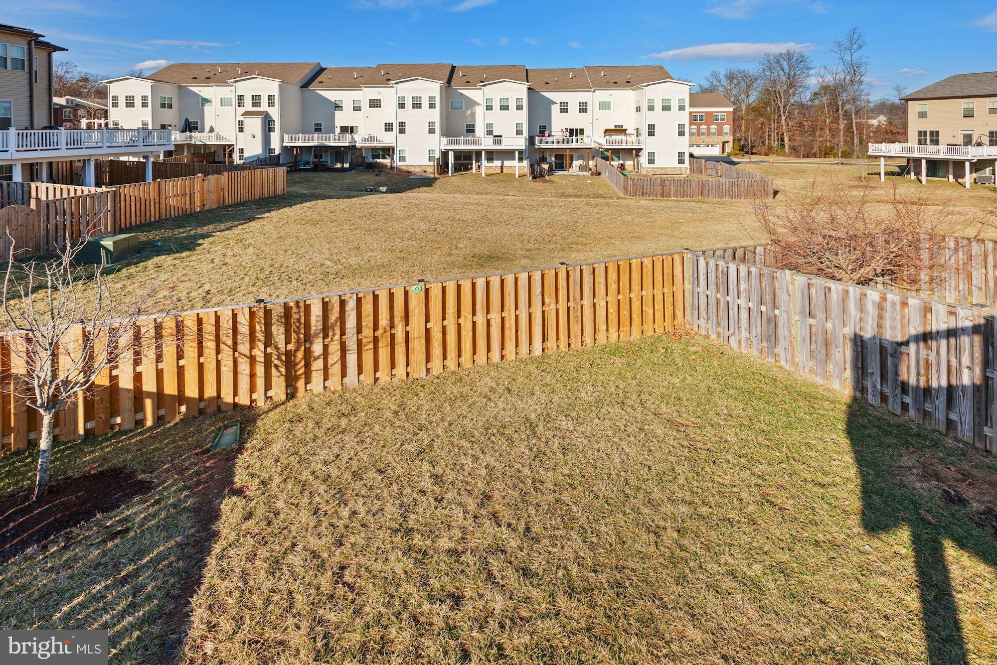 42186 Castle Ridge Square Brambleton, VA 20148 - Photo 19 of 37 Huge fenced-in backyard!