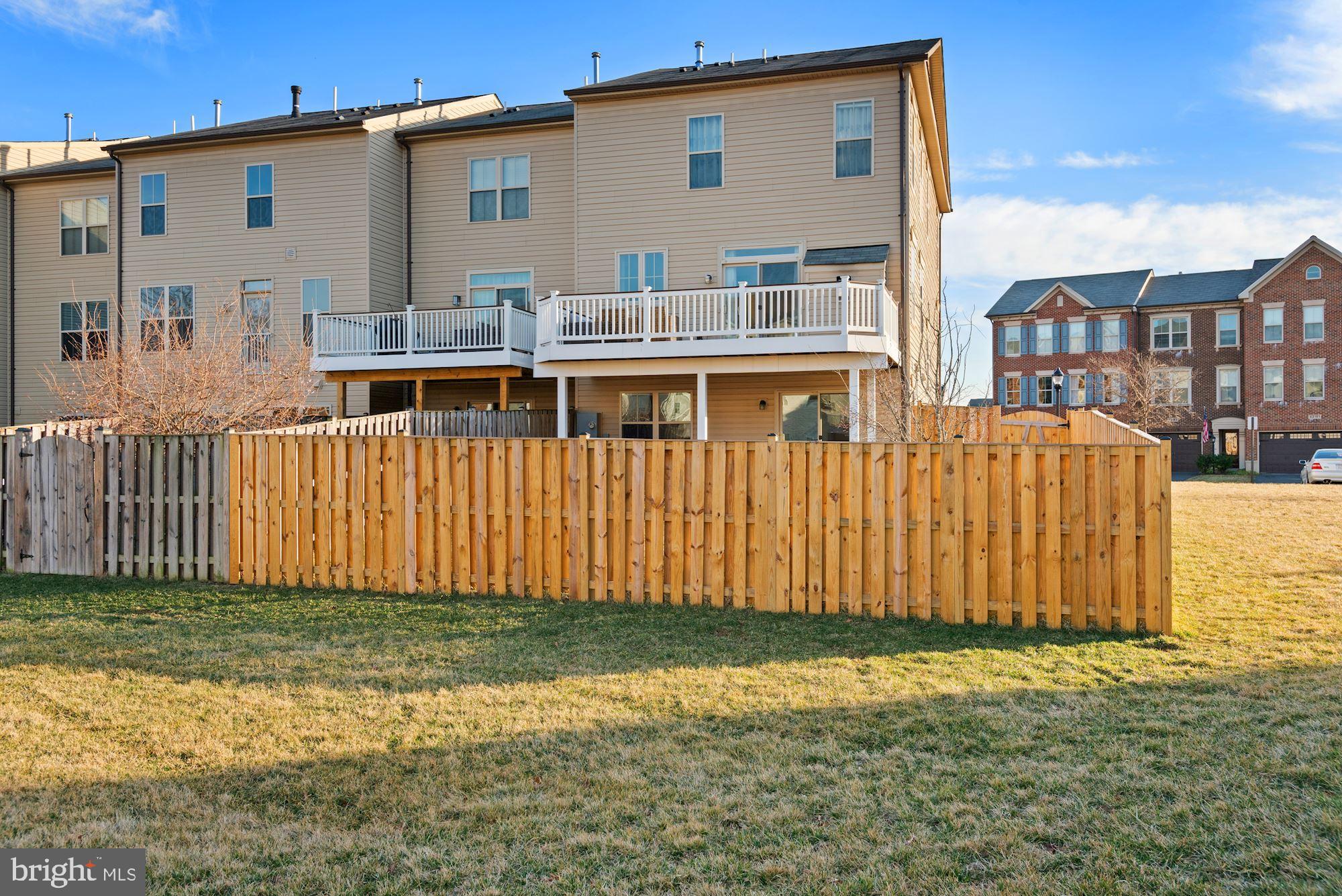 42186 Castle Ridge Square Brambleton, VA 20148 - Photo 36 of 37 Large fenced-in backyard!
