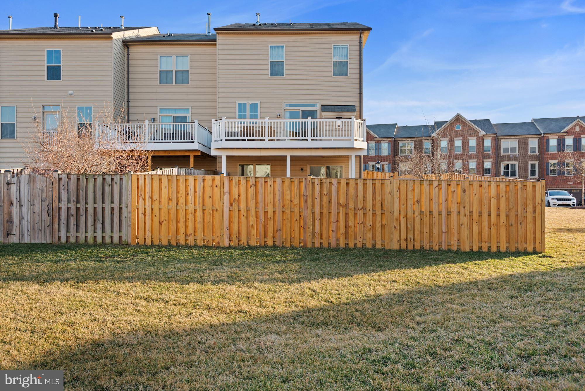 42186 Castle Ridge Square Brambleton, VA 20148 - Photo 37 of 37 Large fenced-in backyard!