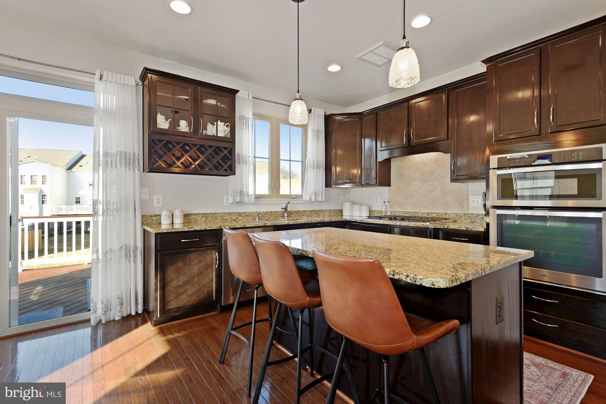 42186 Castle Ridge Square Brambleton, VA 20148 - Photo 10 of 37 Gorgeous kitchen w/ island & granite counters!