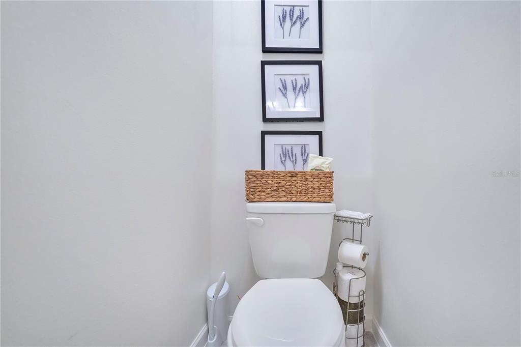 9201 Potomac Drive Fort Pierce, FL 34945 - Photo 12 of 24 a white toilet sitting next to a white wall