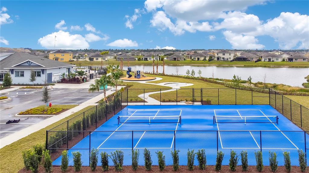 9201 Potomac Drive Fort Pierce, FL 34945 - Photo 20 of 24 a view of a swimming pool with outdoor seating