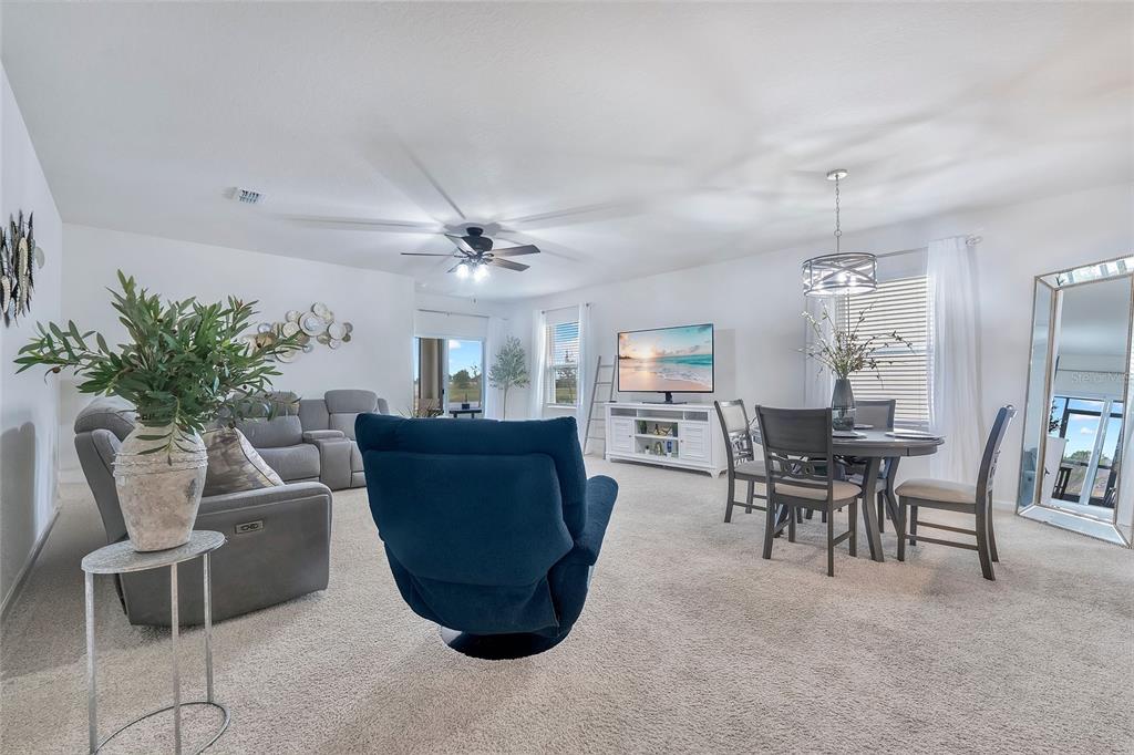 9201 Potomac Drive Fort Pierce, FL 34945 - Photo 3 of 24 a dining room with furniture and window