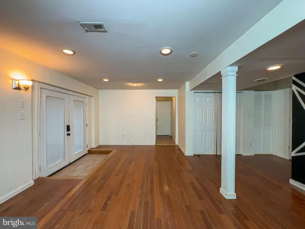 a view of a livingroom with wooden floor