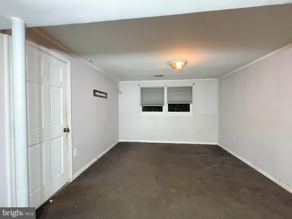 en empty room with windows