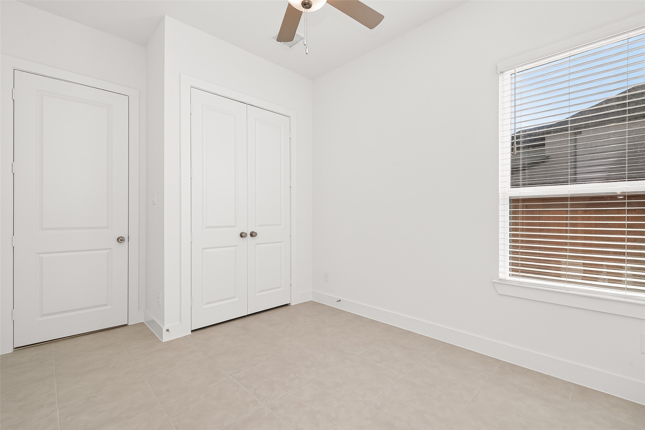 4916 Northern Wds Drive Spring, TX 77386 - Photo 23 of 44 an empty room with a window