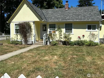 a view of kitchen and wooden floor