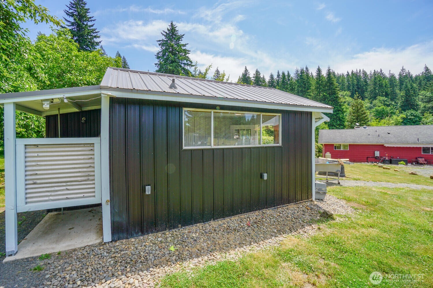 19910 Northeast 356th Street Yacolt, WA 98675 - Photo 31 of 37 a backyard of a house with lots of green space