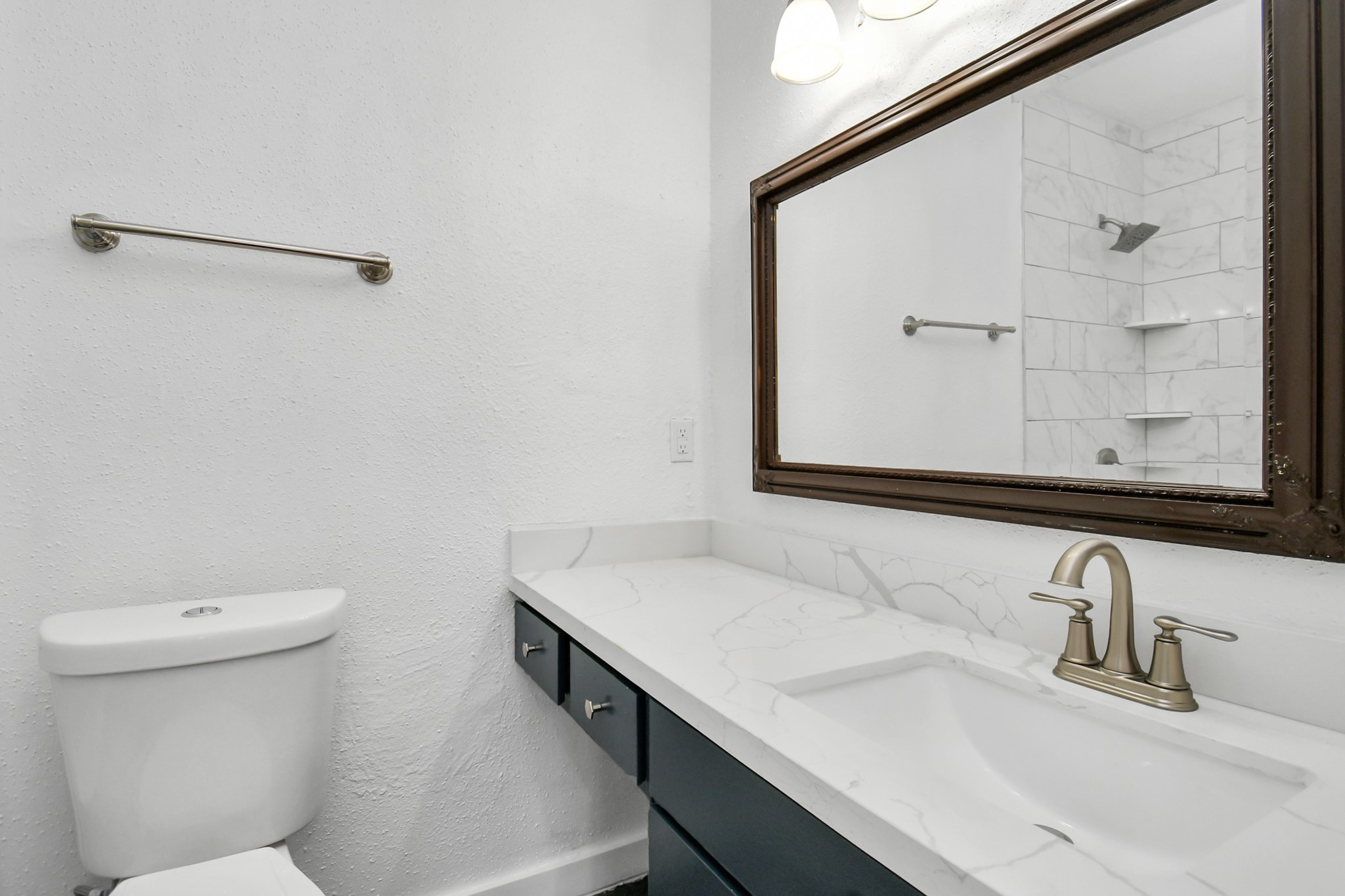 2002 Gentryside Drive, Unit 113 Houston, TX 77077 - Photo 20 of 32 a bathroom with a sink and a toilet