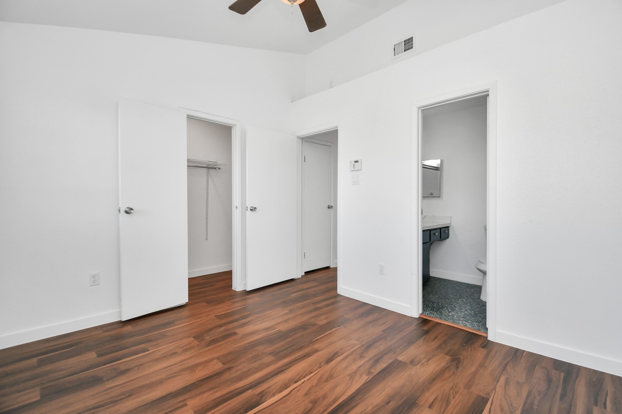 2002 Gentryside Drive, Unit 113 Houston, TX 77077 - Photo 23 of 32 an empty room with wooden floor