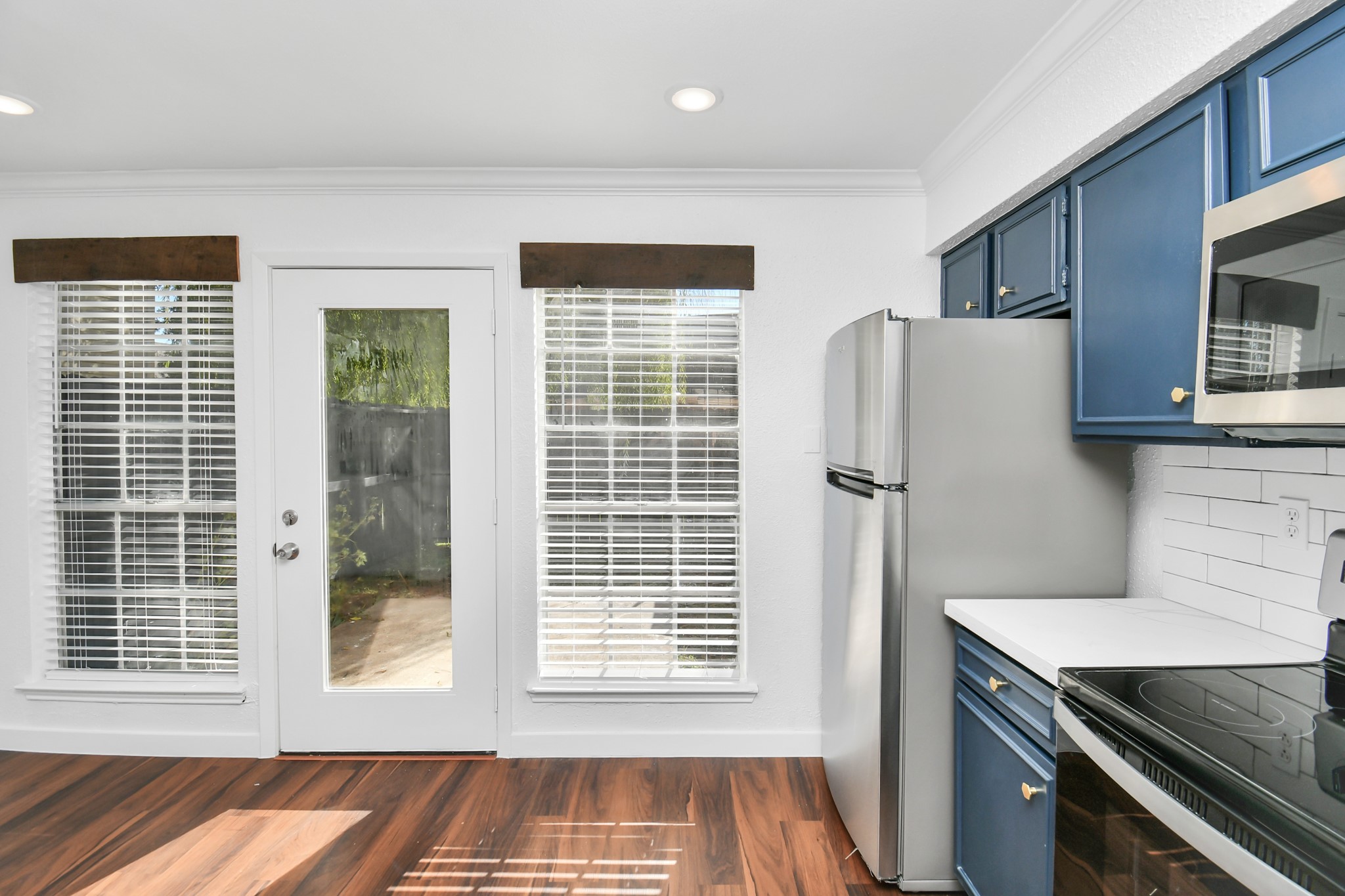 2002 Gentryside Drive, Unit 113 Houston, TX 77077 - Photo 10 of 32 a view of a kitchen with an empty space and a window