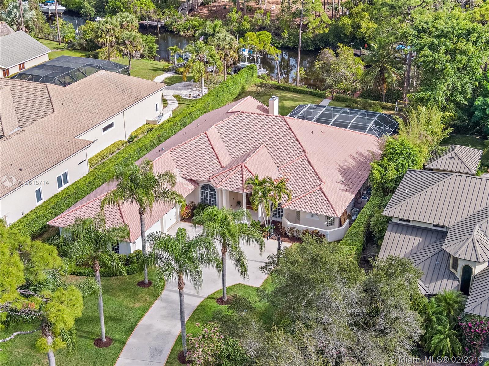 18897 Southeast Loxahatchee River Road Jupiter, FL 33458 - Photo 2 of 48 Aerial view with canal.