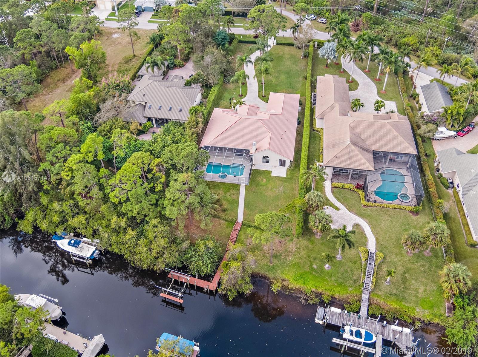 18897 Southeast Loxahatchee River Road Jupiter, FL 33458 - Photo 35 of 48 Aerial view 34ft private dock with boat lift.