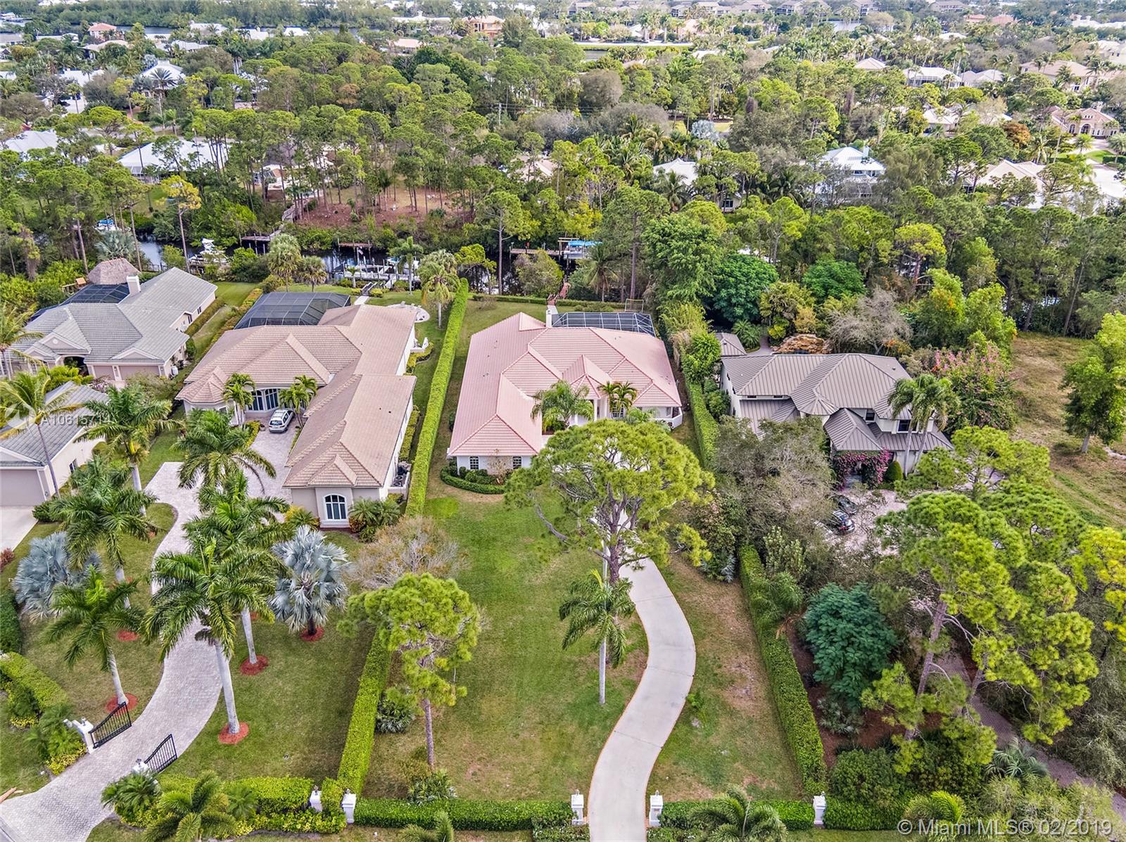 18897 Southeast Loxahatchee River Road Jupiter, FL 33458 - Photo 37 of 48 Aerial view of property with .799 acres