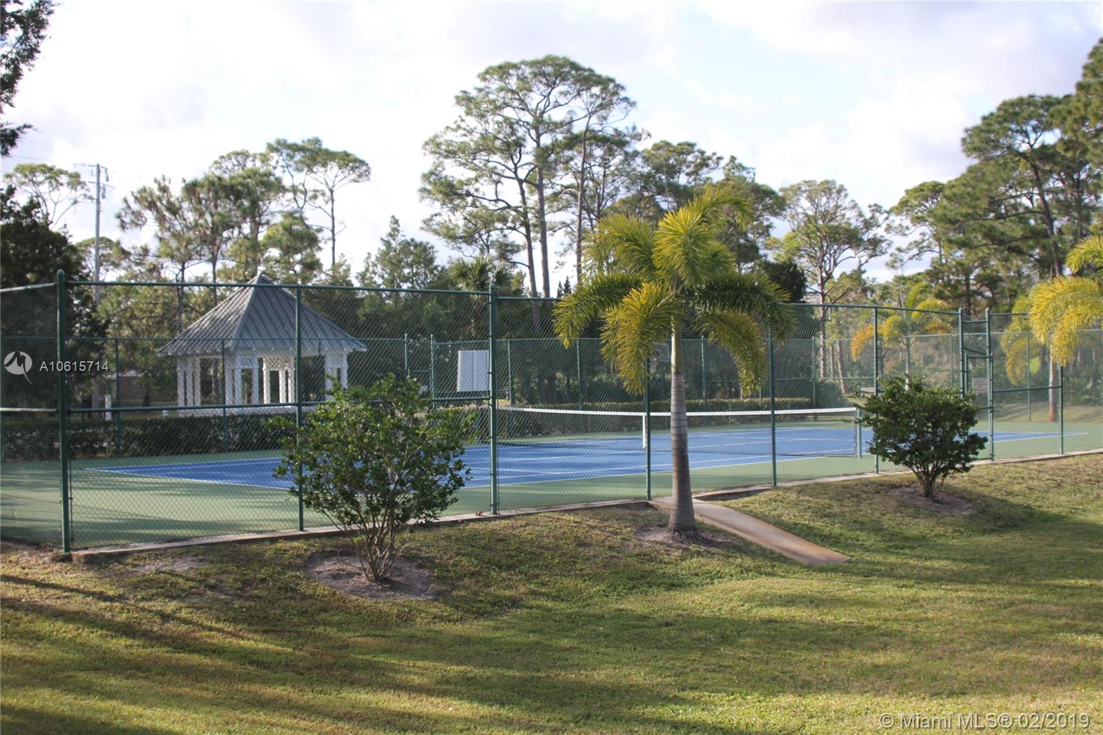 18897 Southeast Loxahatchee River Road Jupiter, FL 33458 - Photo 42 of 48 Community tennis court and gazebo.