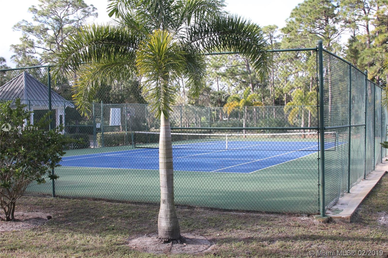 18897 Southeast Loxahatchee River Road Jupiter, FL 33458 - Photo 43 of 48 Community tennis court and gazebo.