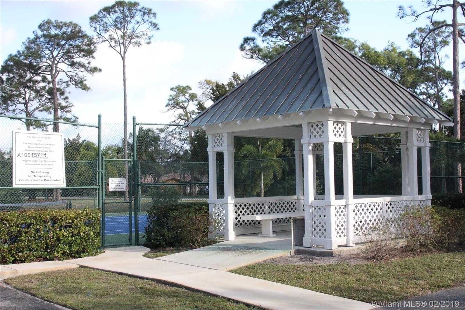 18897 Southeast Loxahatchee River Road Jupiter, FL 33458 - Photo 46 of 48 Community tennis court and gazebo.
