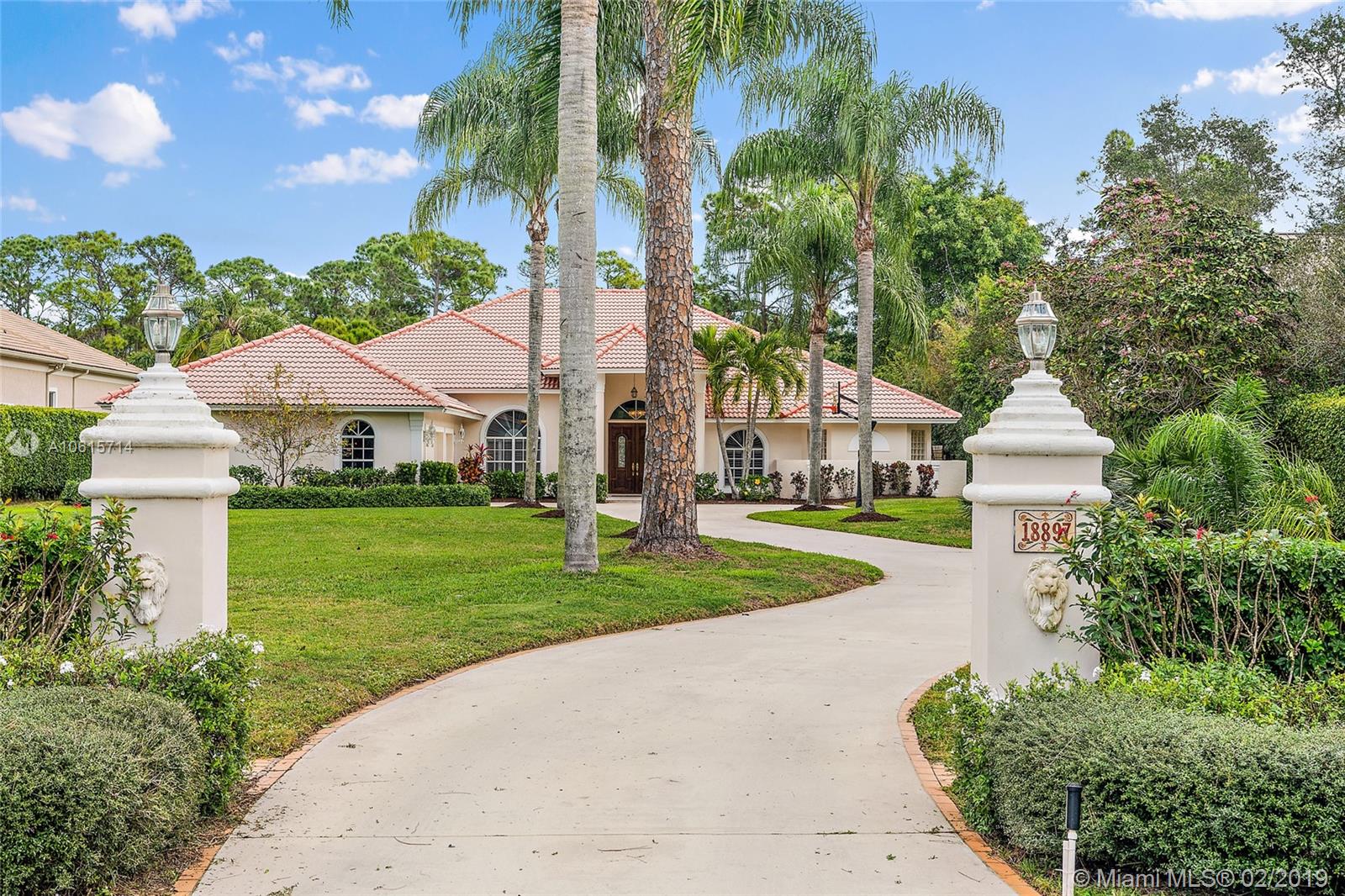 18897 Southeast Loxahatchee River Road Jupiter, FL 33458 - Photo 47 of 48 Front exterior