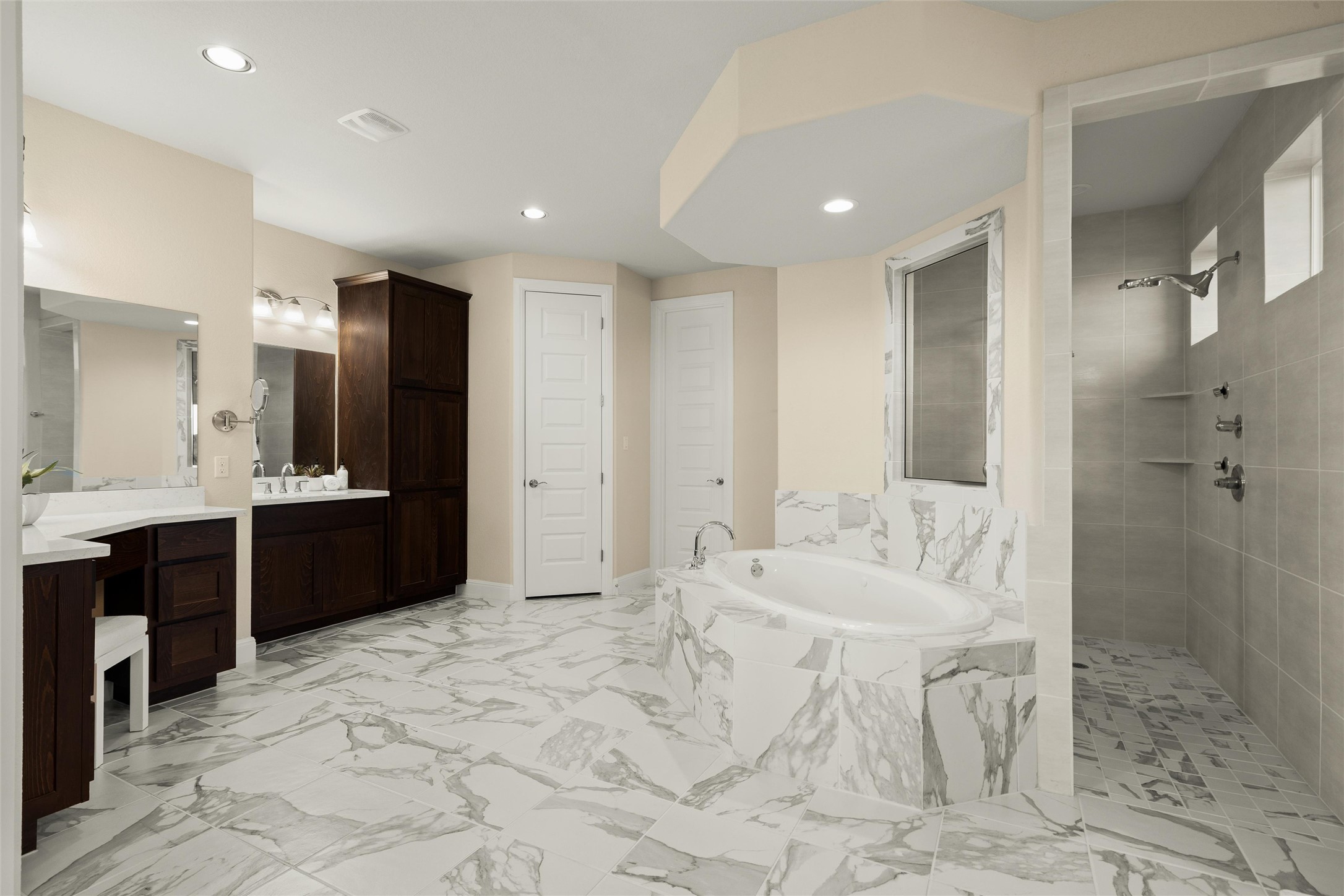 479 Crosswater Lane Dripping Springs, TX 78620 - Photo 20 of 40 a large bathroom with a sink and a mirror