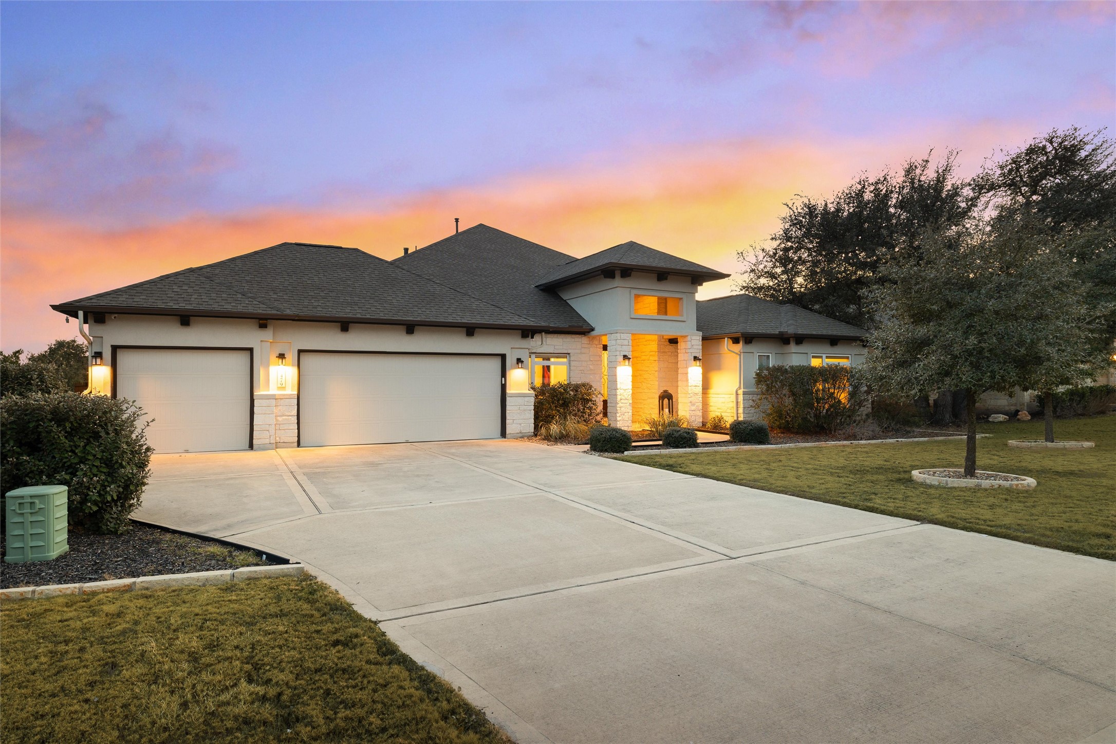 479 Crosswater Lane Dripping Springs, TX 78620 - Photo 2 of 40 a front view of a house with a yard