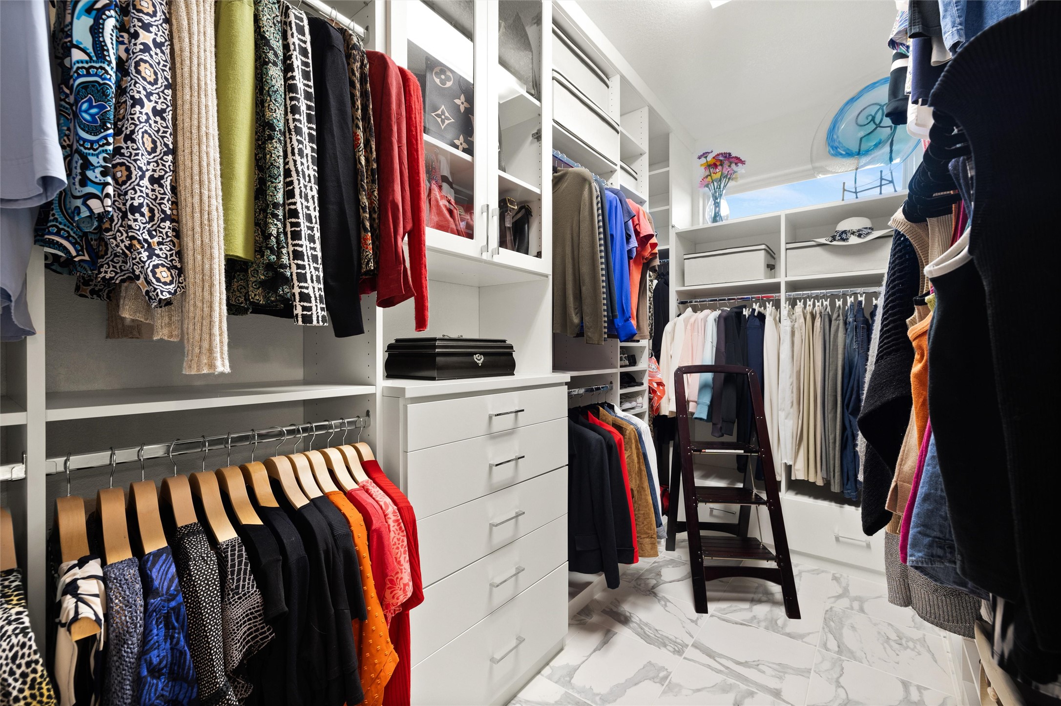 479 Crosswater Lane Dripping Springs, TX 78620 - Photo 22 of 40 a view of walk in closet with clothes and shoes