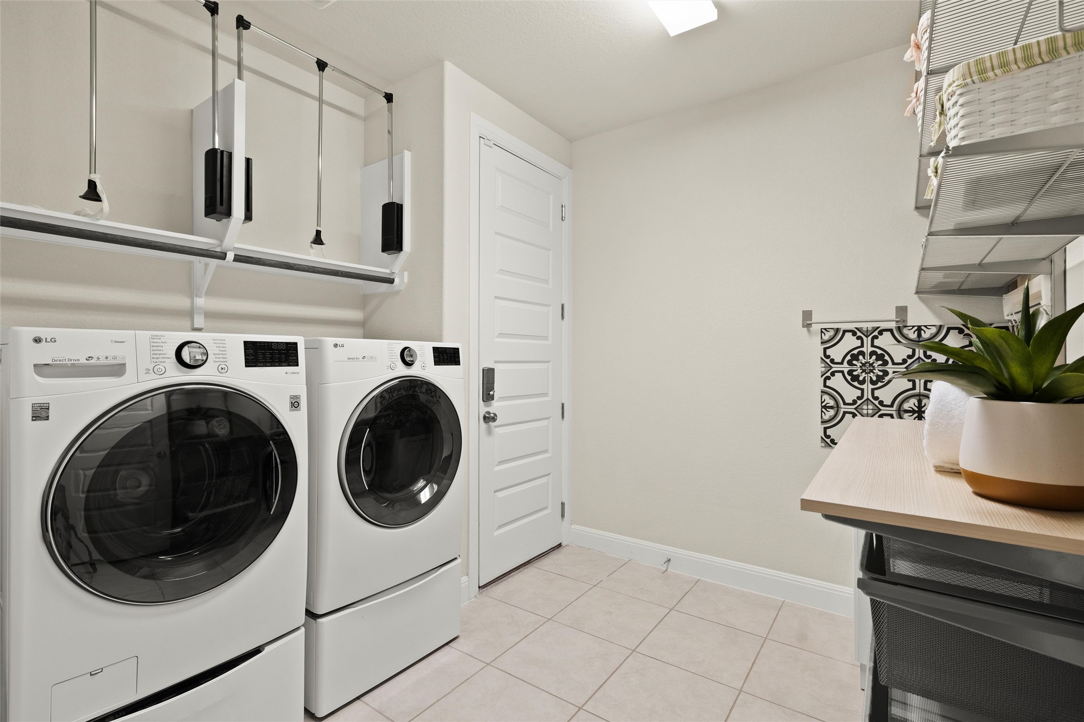 479 Crosswater Lane Dripping Springs, TX 78620 - Photo 30 of 40 a utility room with sink dryer and washer