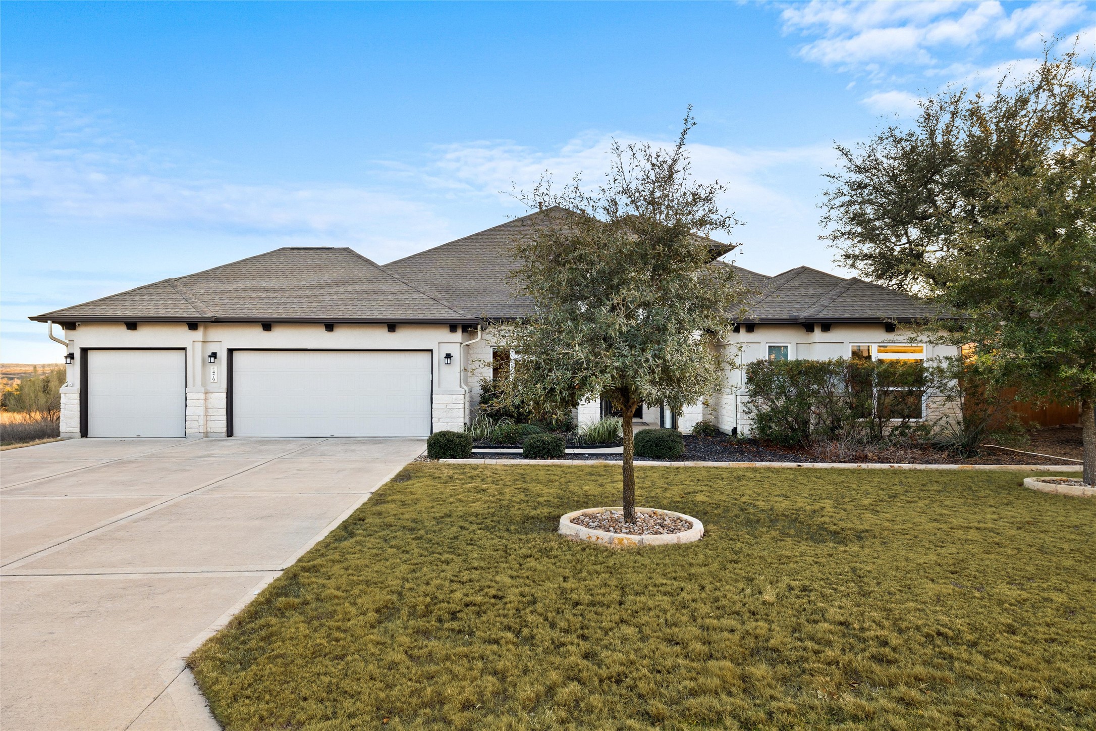479 Crosswater Lane Dripping Springs, TX 78620 - Photo 5 of 40 a front view of a house with a yard