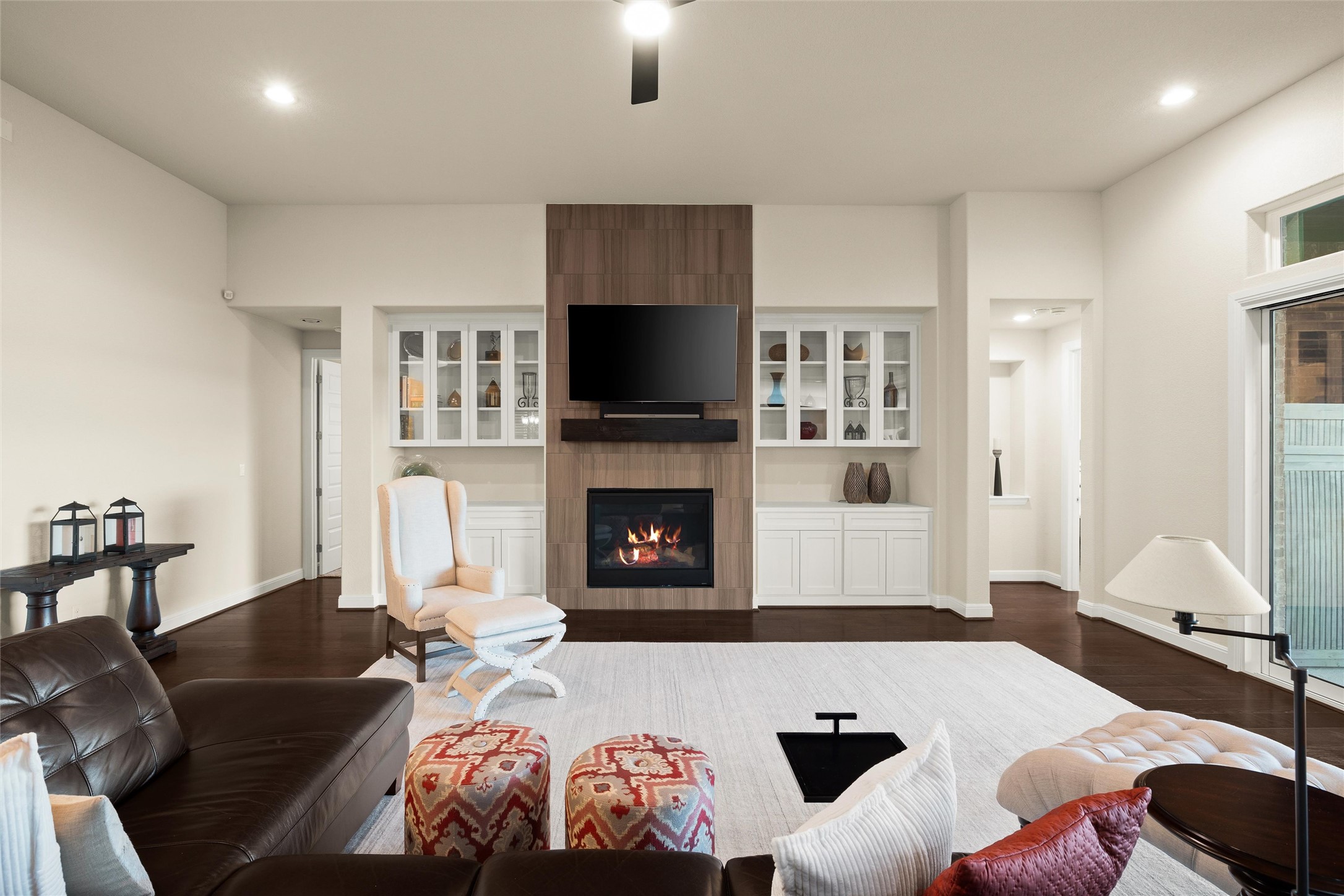 479 Crosswater Lane Dripping Springs, TX 78620 - Photo 9 of 40 a living room with furniture or fireplace and a flat screen tv