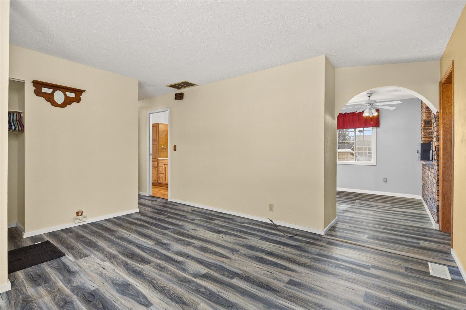 794 Farragut Avenue Romeoville, IL 60446 - Photo 11 of 23 a view of a livingroom with wooden floor and closet