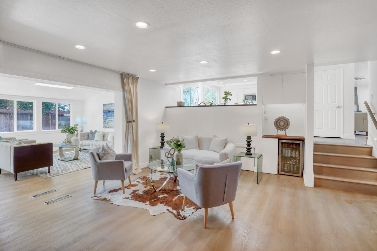 3368 Camarones Place San Ramon, CA 94583 - Photo 21 of 27 a living room with furniture a fireplace and a dining table with wooden floor