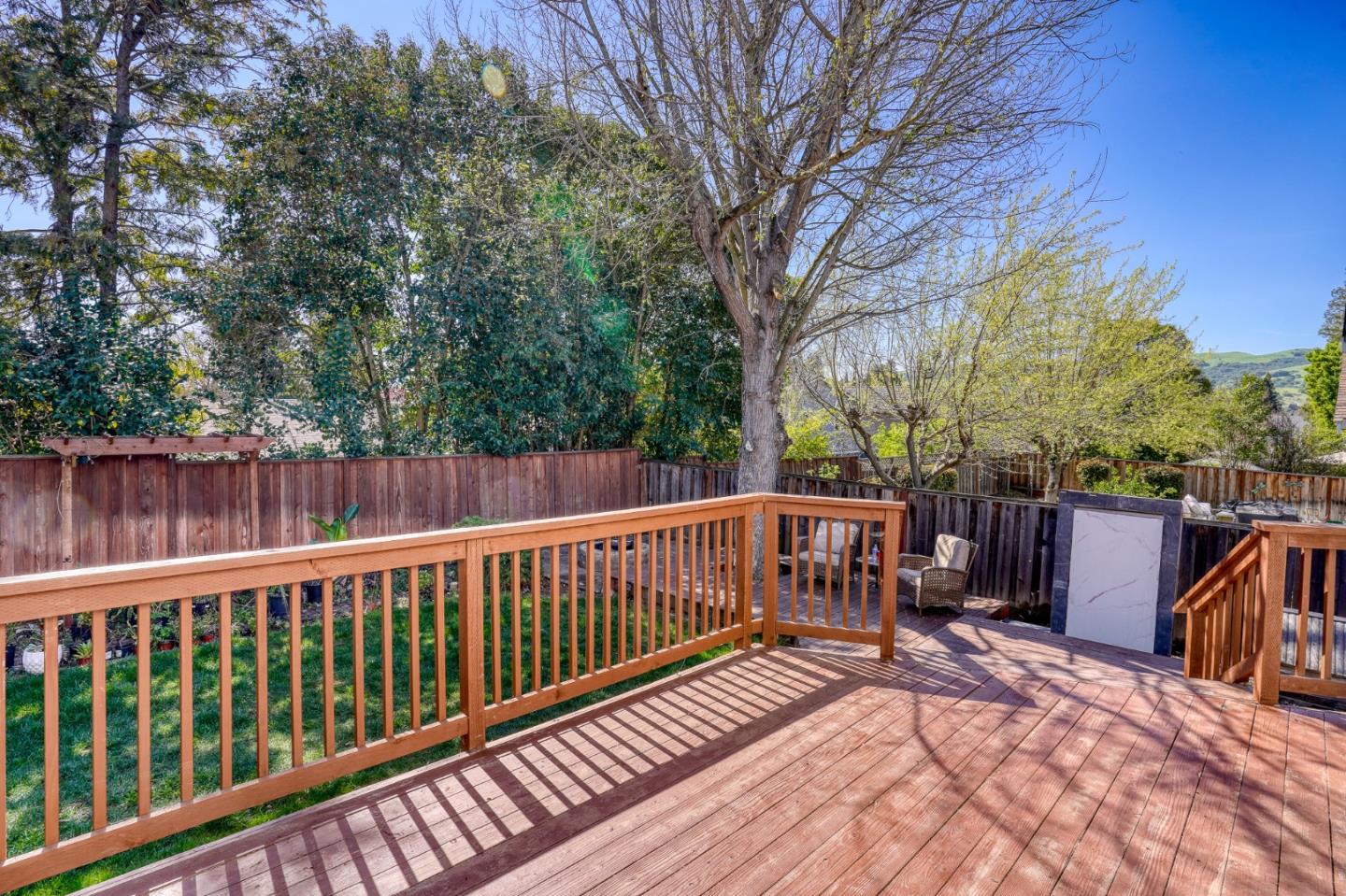 3368 Camarones Place San Ramon, CA 94583 - Photo 22 of 27 a view of a wooden deck with a large trees