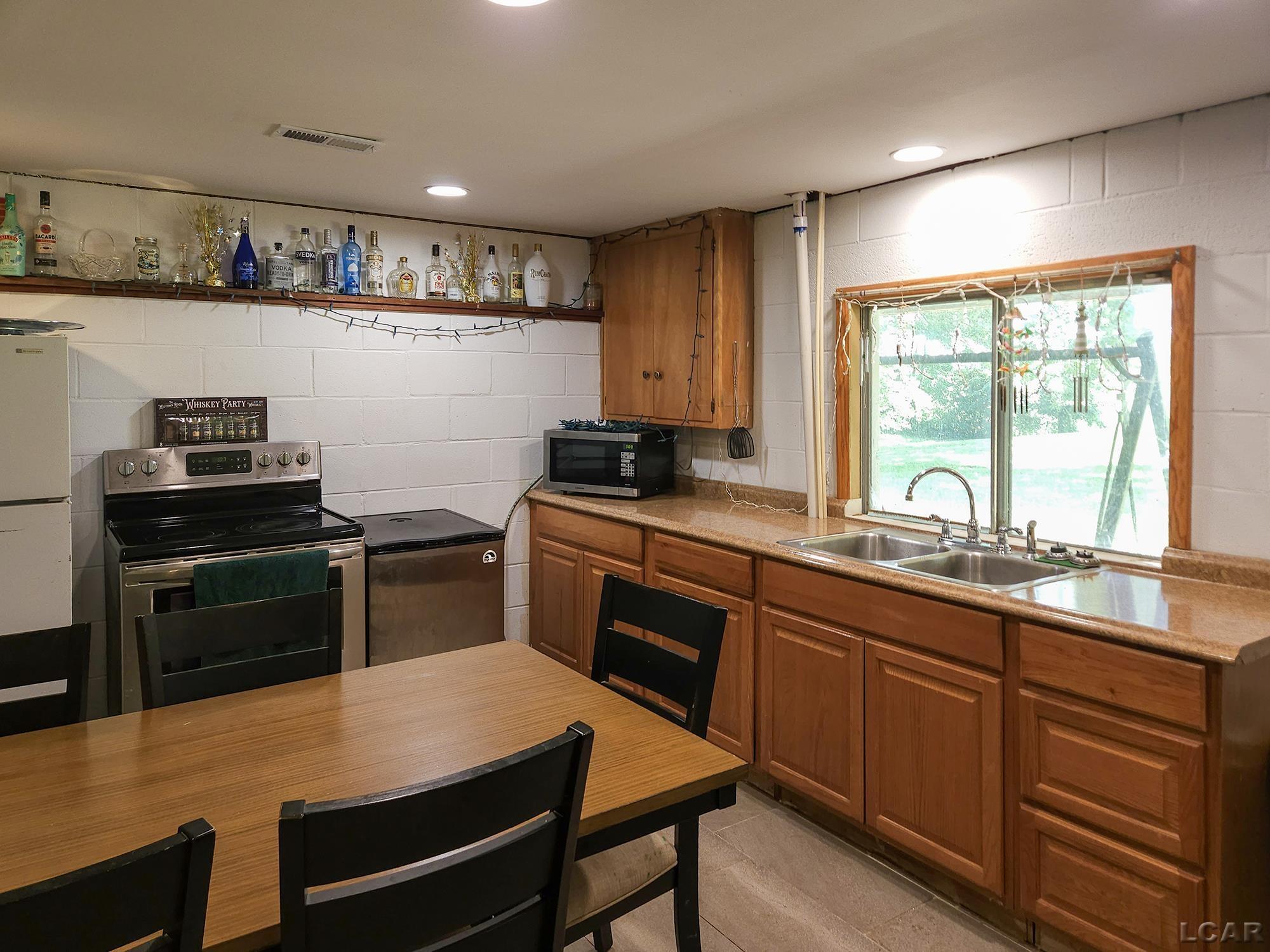 6003 Lake Road Osseo, MI 49266 - Photo 15 of 28 50181385-e43df5ac-c66c-435f-bcaa-0fa29a0e704e.JPG