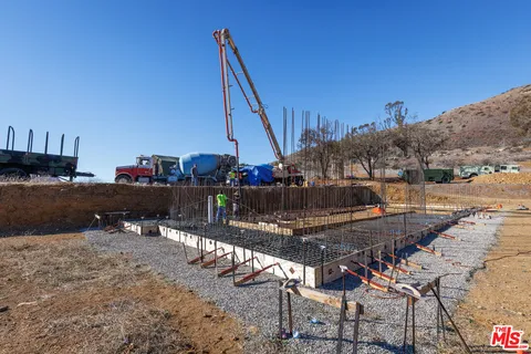 a view of a terrace with chairs