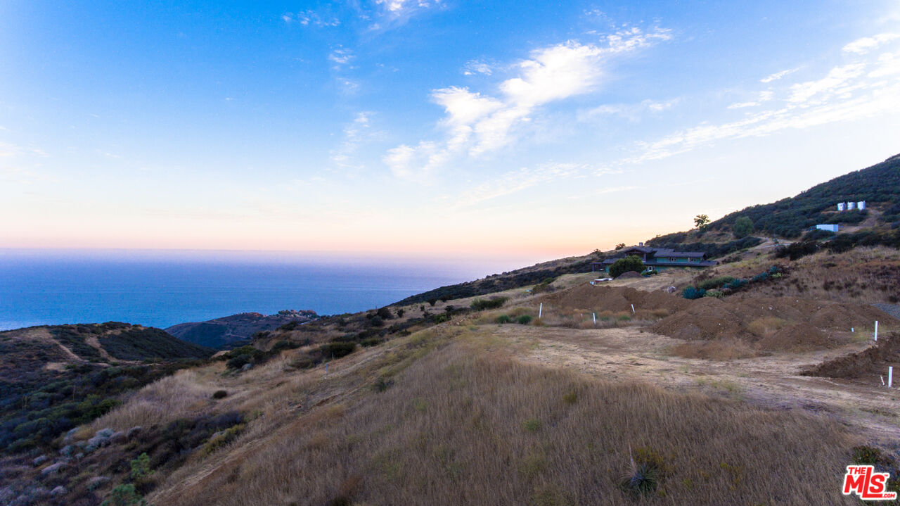 9950 Cotharin Road Malibu, CA 90265 - Photo 34 of 48 a view of sunset