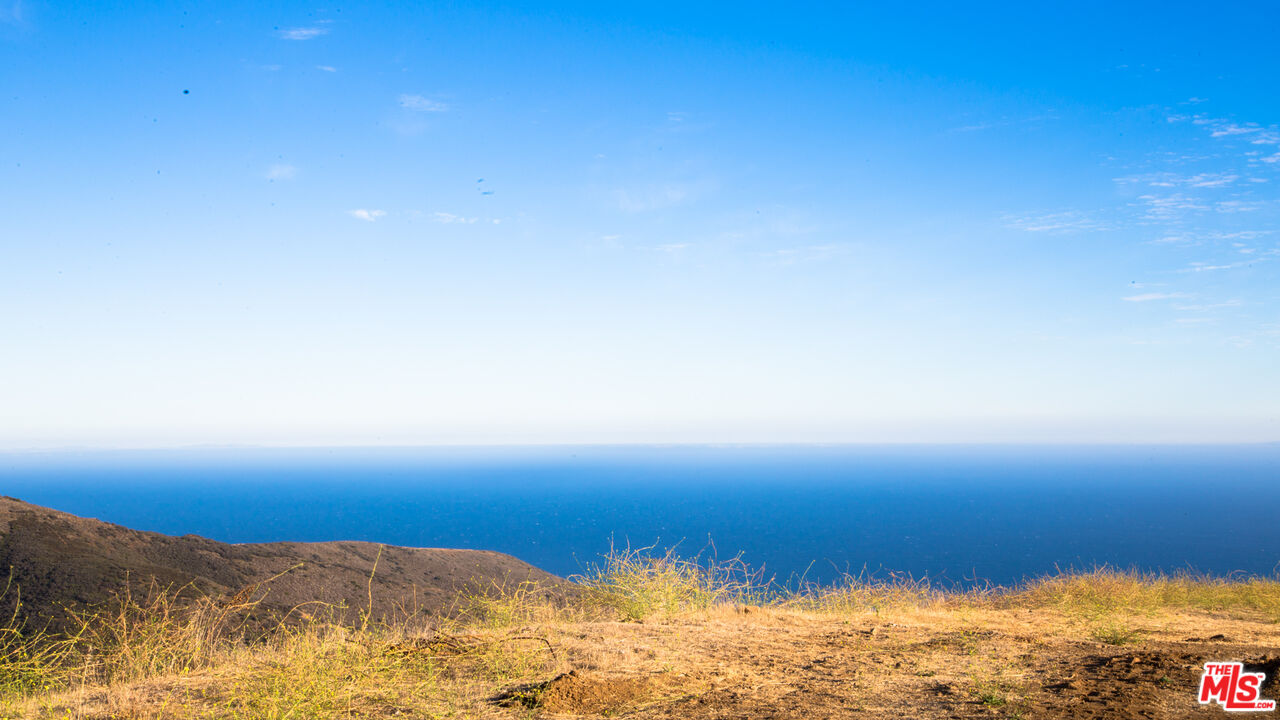 9950 Cotharin Road Malibu, CA 90265 - Photo 37 of 48 a view of ocean and sunset
