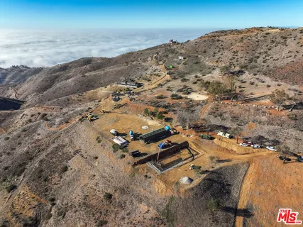 an aerial view of beach and ocean