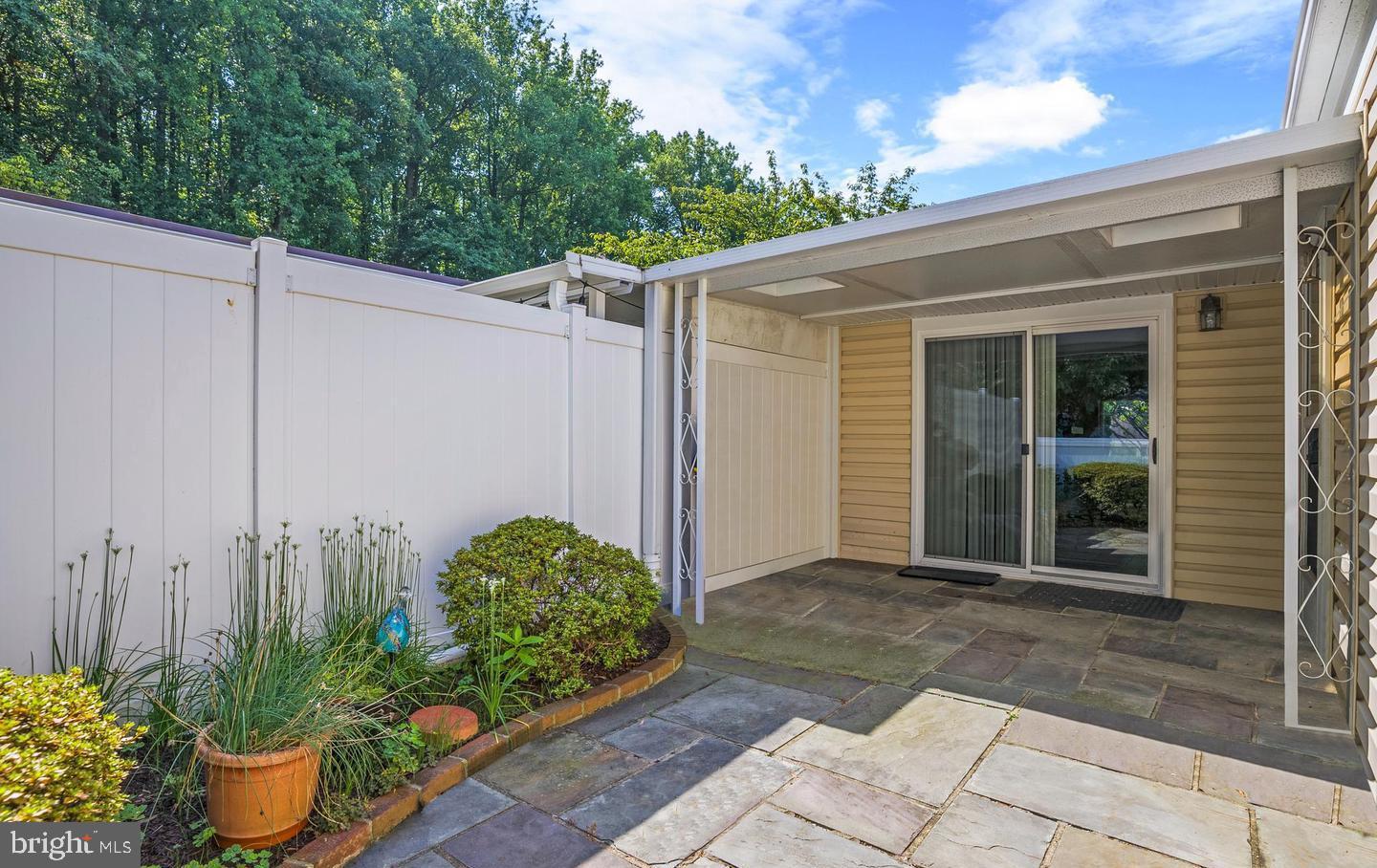 14654 Kelmscot Drive, Unit 236B Silver Spring, MD 20906 - Photo 11 of 27 a view of a backyard with plants