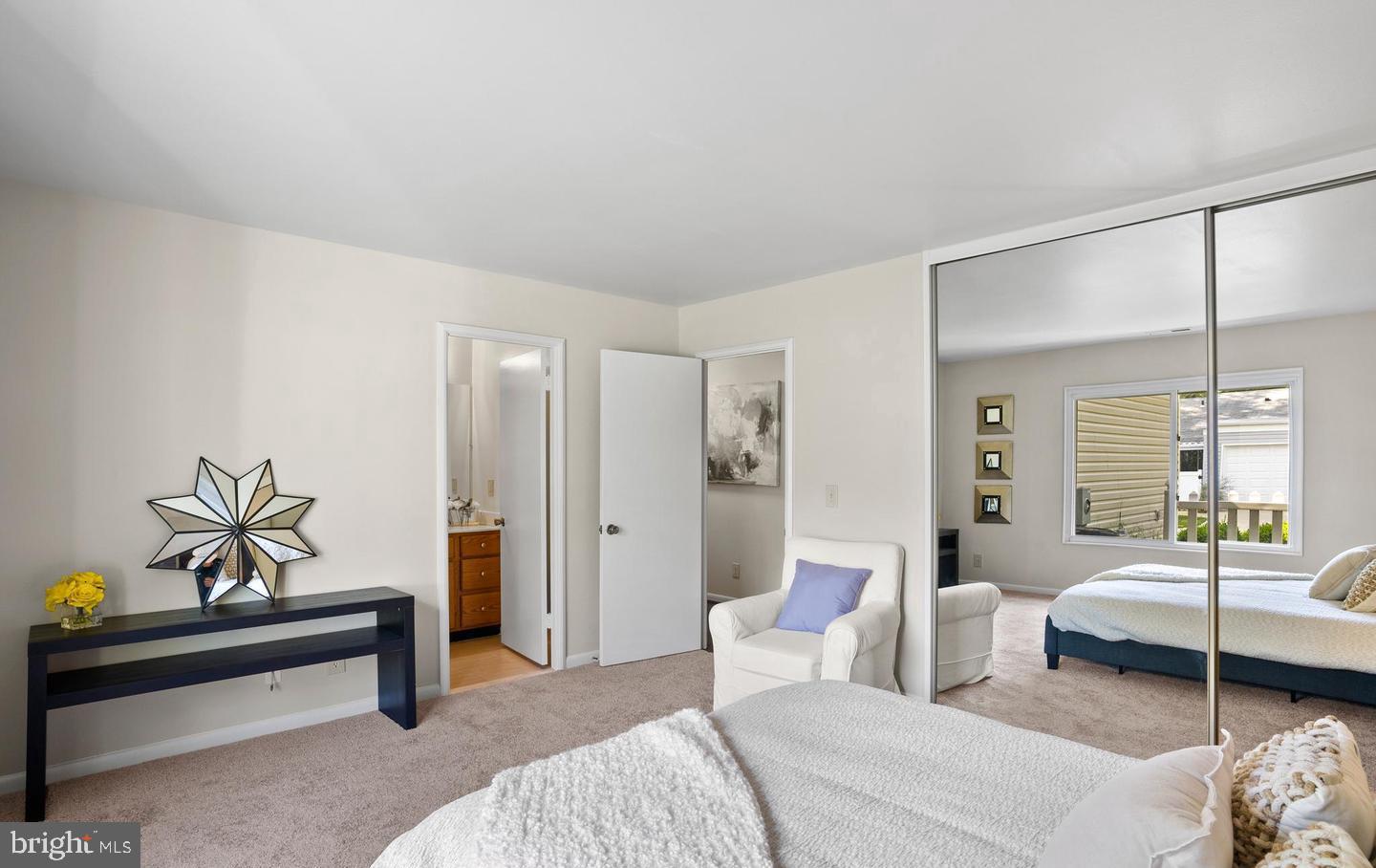 14654 Kelmscot Drive, Unit 236B Silver Spring, MD 20906 - Photo 15 of 27 a bedroom with furniture and a window