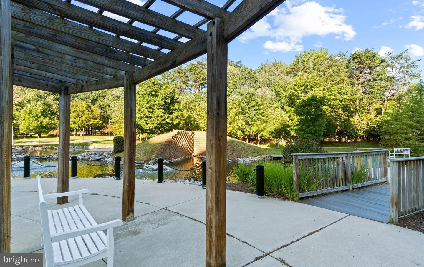 14654 Kelmscot Drive, Unit 236B Silver Spring, MD 20906 - Photo 26 of 27 a view of a porch with wooden floor