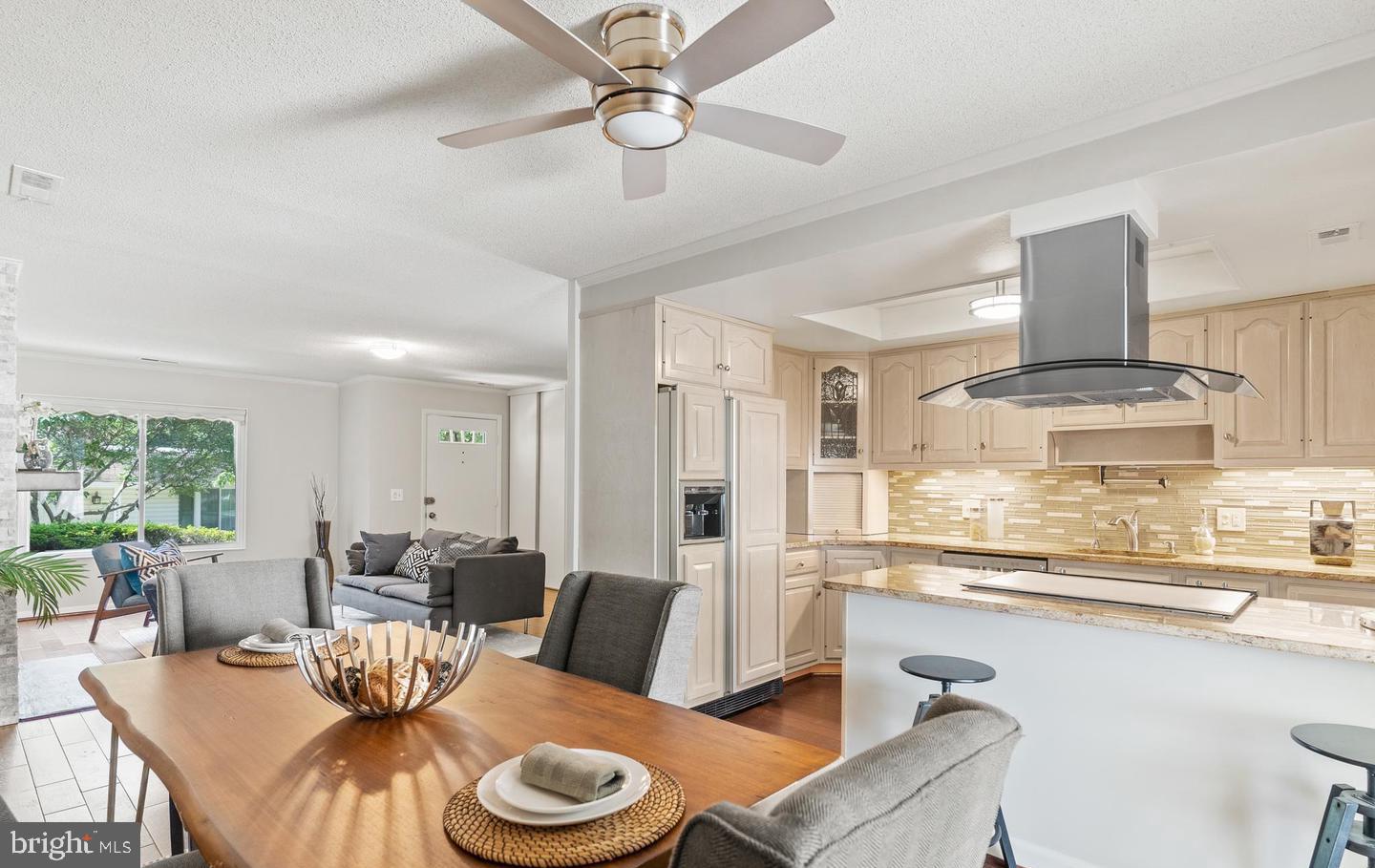 14654 Kelmscot Drive, Unit 236B Silver Spring, MD 20906 - Photo 9 of 27 a living room with furniture and a large window
