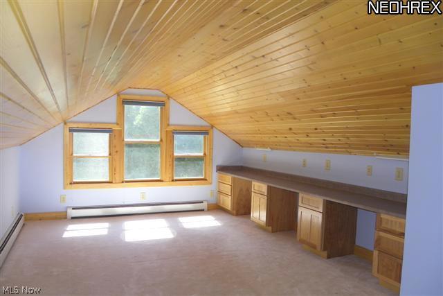 2614 Sweitzer Road Uniontown, OH 44685 - Photo 17 of 25 Bedroom 2 or Hobby room w/ built-in cabinets, work area & possible walk-in closet