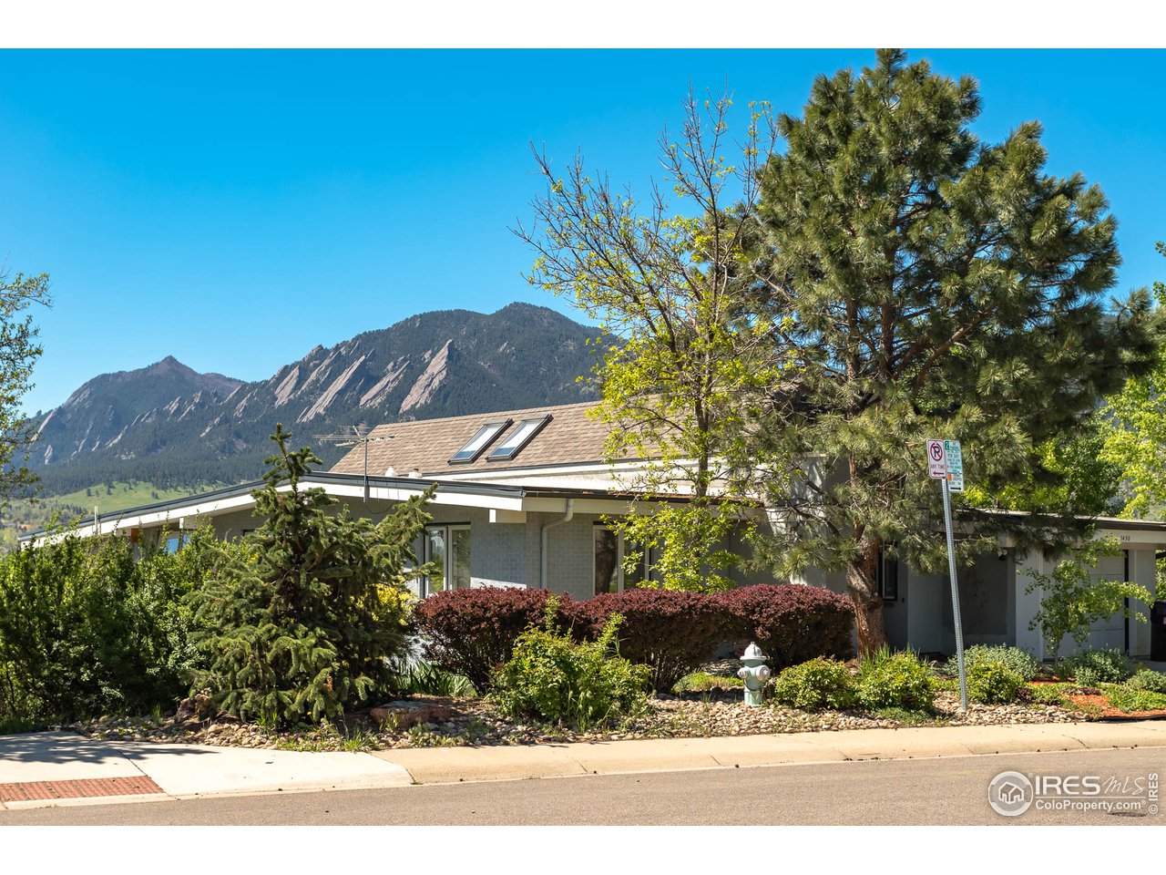1450 High Street Boulder, CO 80304 - Photo 1 of 25 a view of a house with a yard and potted plants