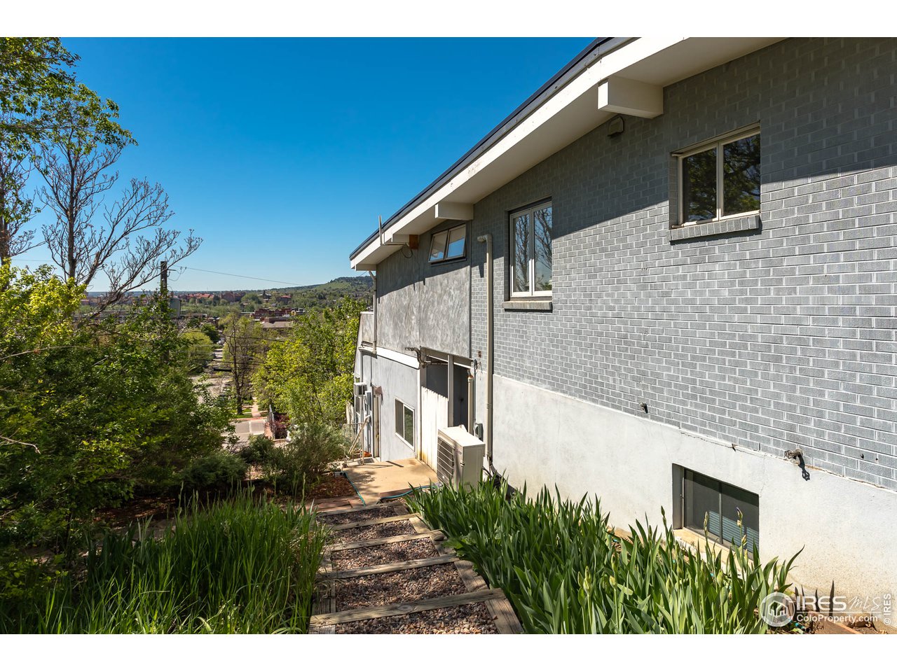 1450 High Street Boulder, CO 80304 - Photo 17 of 25 a view of backyard with plants