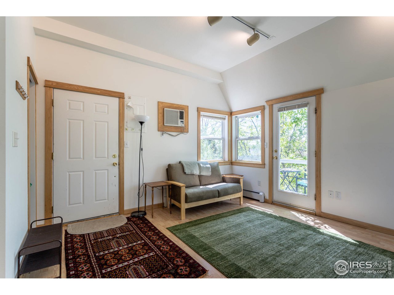 1450 High Street Boulder, CO 80304 - Photo 19 of 25 a living room with furniture and a window