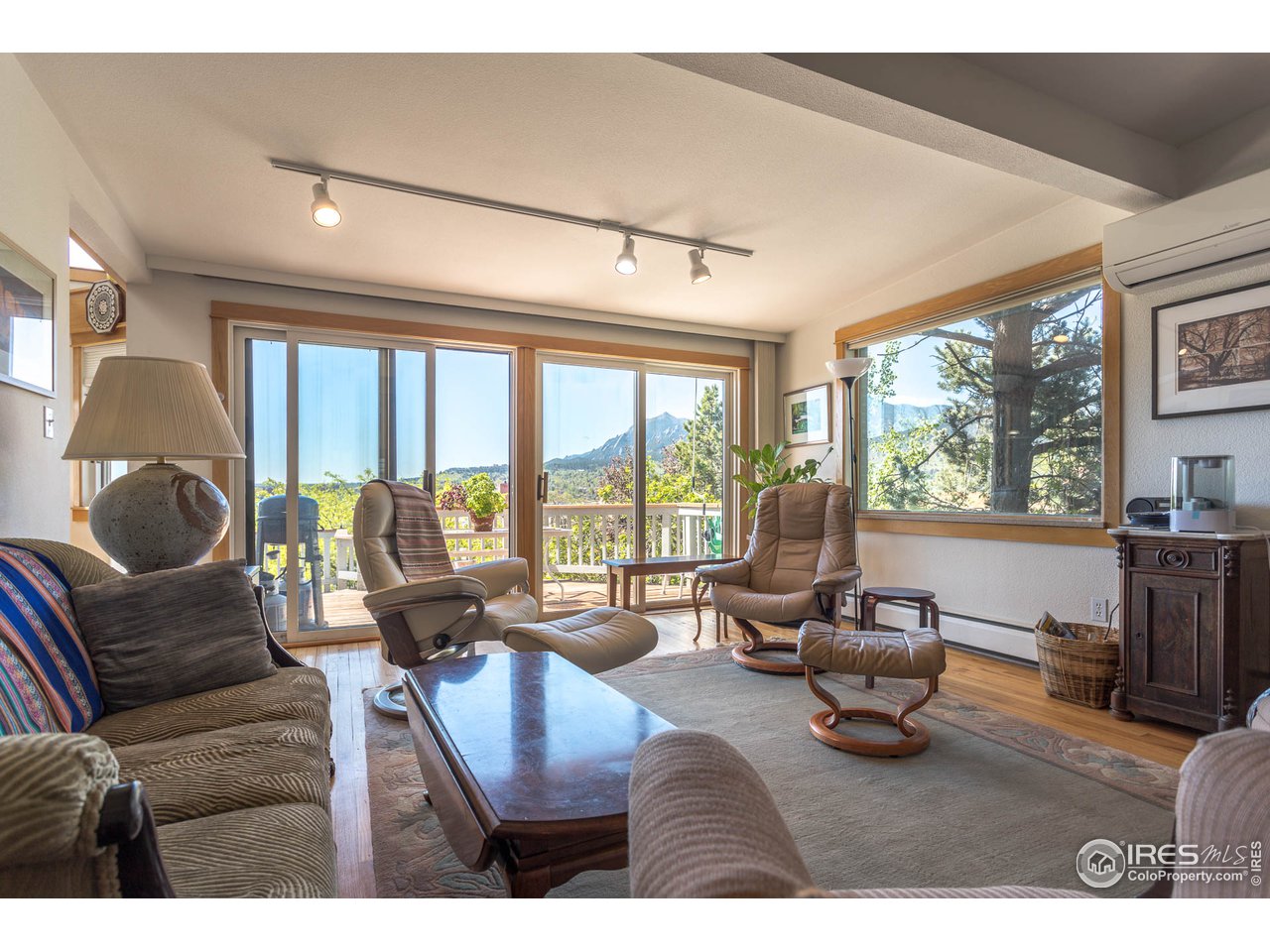 1450 High Street Boulder, CO 80304 - Photo 8 of 25 a living room with furniture and a large window