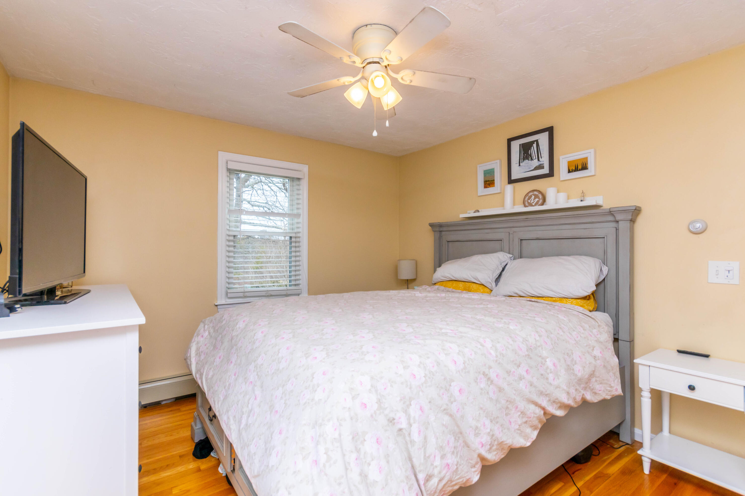 2 Long Boat Road Bourne, MA 02532 - Photo 13 of 30 a bedroom with a bed and a flat screen tv