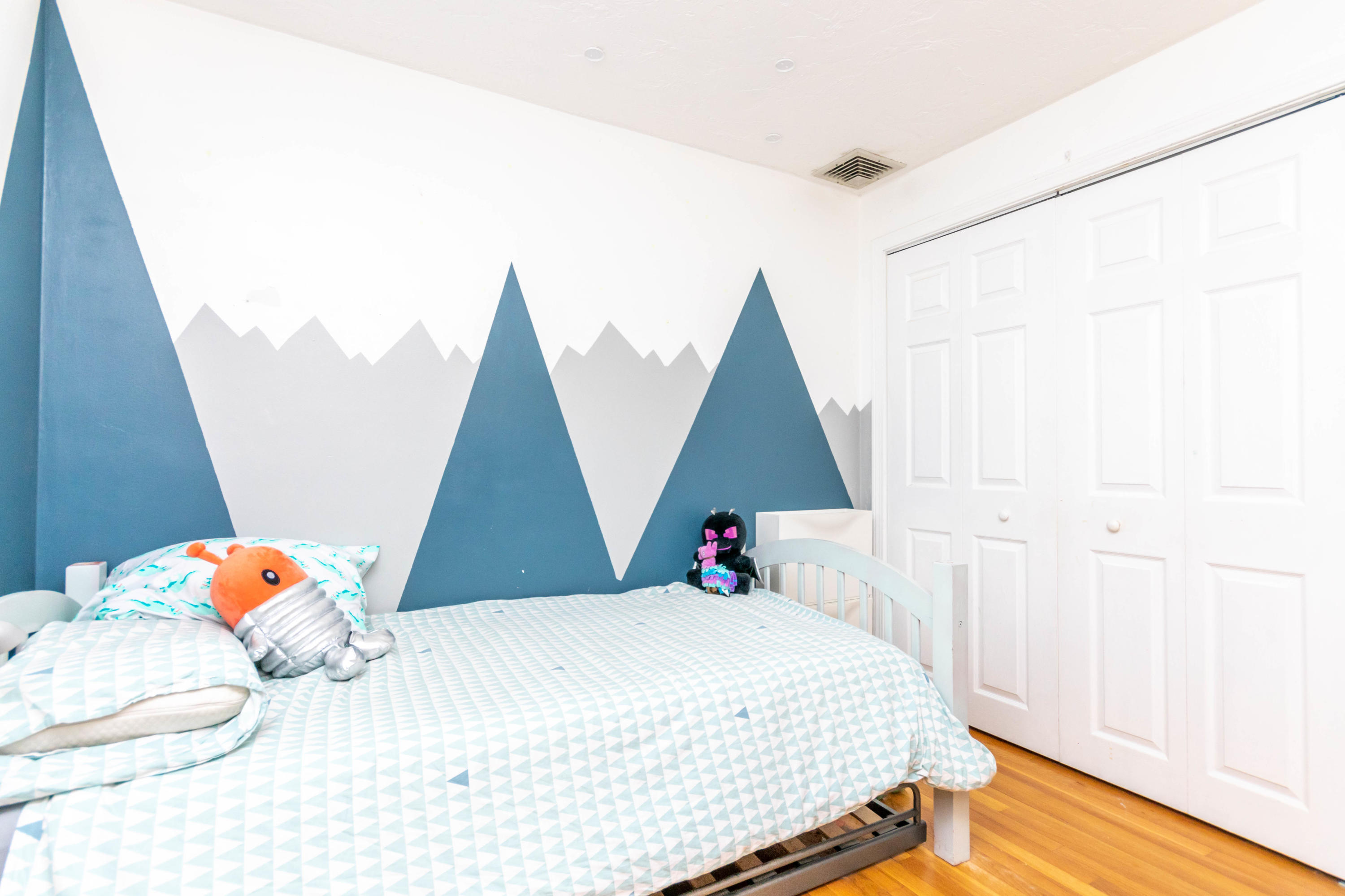 2 Long Boat Road Bourne, MA 02532 - Photo 22 of 30 a bedroom with a bed and a window