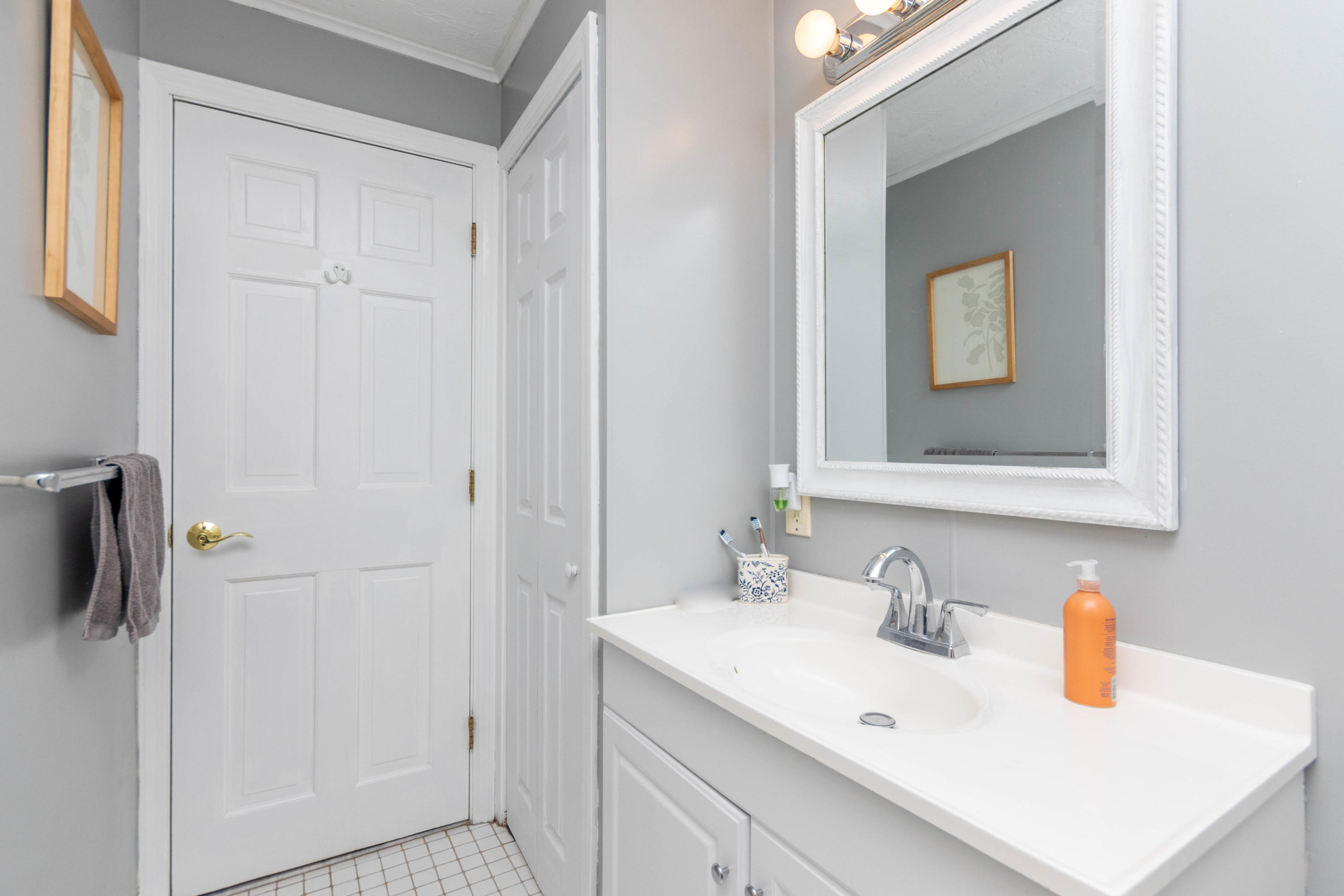 2 Long Boat Road Bourne, MA 02532 - Photo 24 of 30 a bathroom with a sink vanity and a mirror